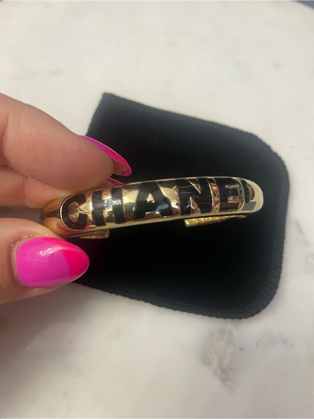 Luxe’ Gold-Tone Logo Cuff Bracelet with Black Lettering